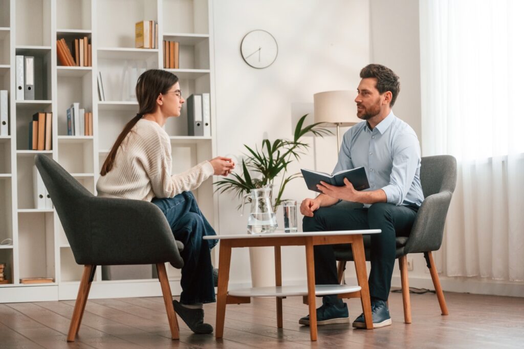 Therapist conducting cbt therapy session in fresno, california.