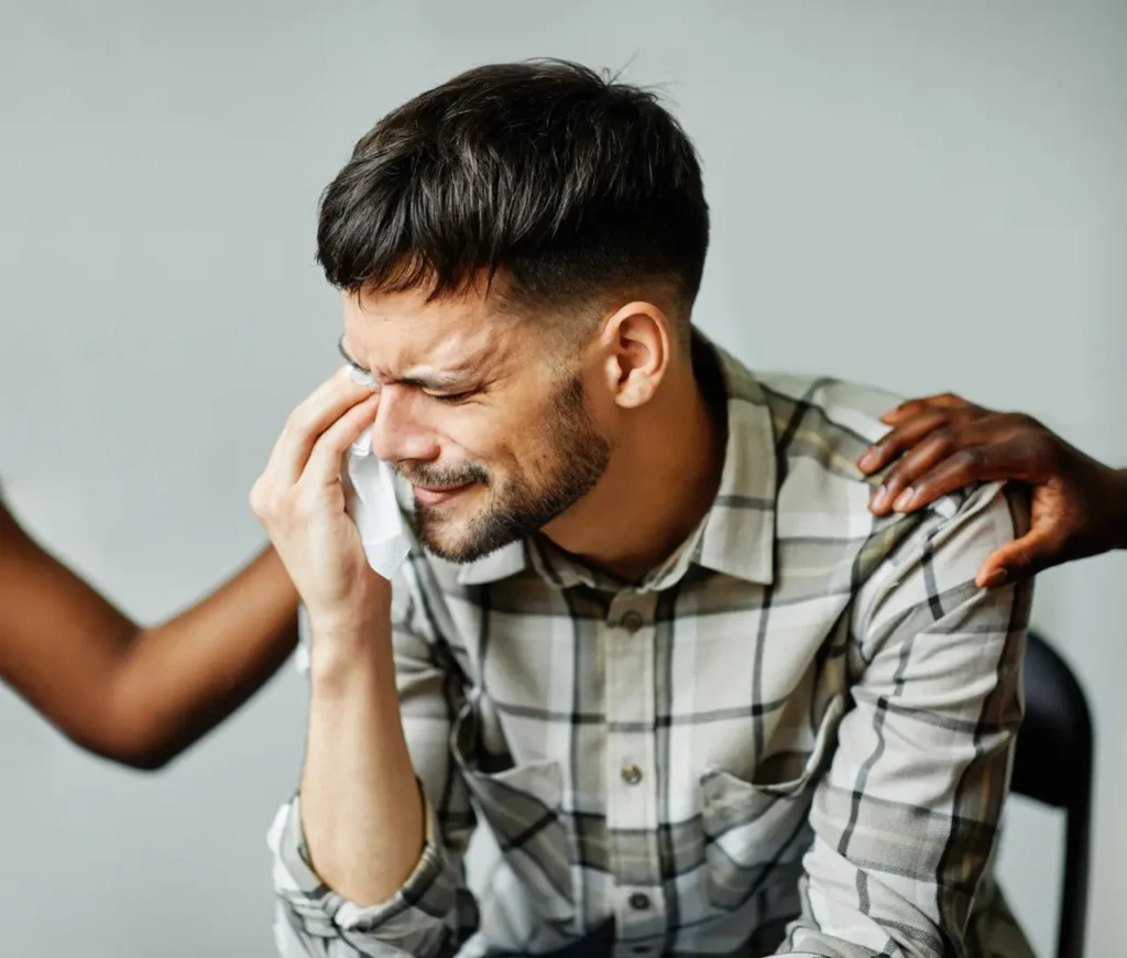 Man crying in alcohol rehab at sierra meadows in visalia and fresno california.