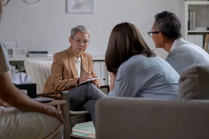 couple doing crisis intervention for mood disorders in fresno ca with a therapist.