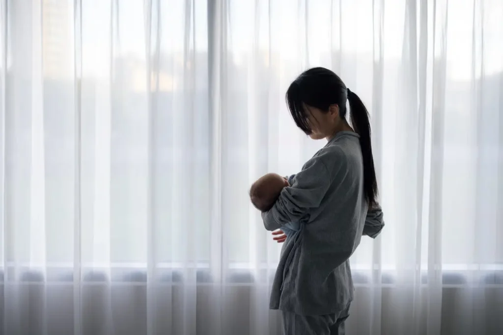 Mother suffering from post-partum depression.