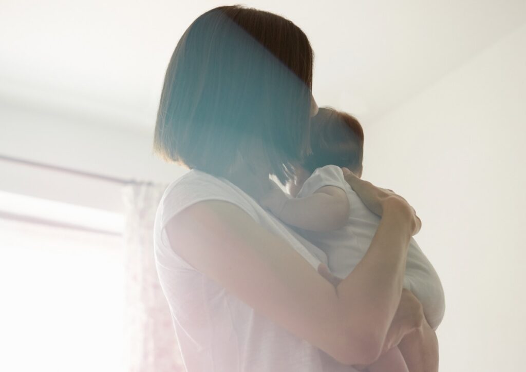 woman tenderly holding an infant indoors 2026 03 25 04 38 42 utc Large e1779929959373 - Mental Health Treatment at Sierra Meadows Behavioral Health