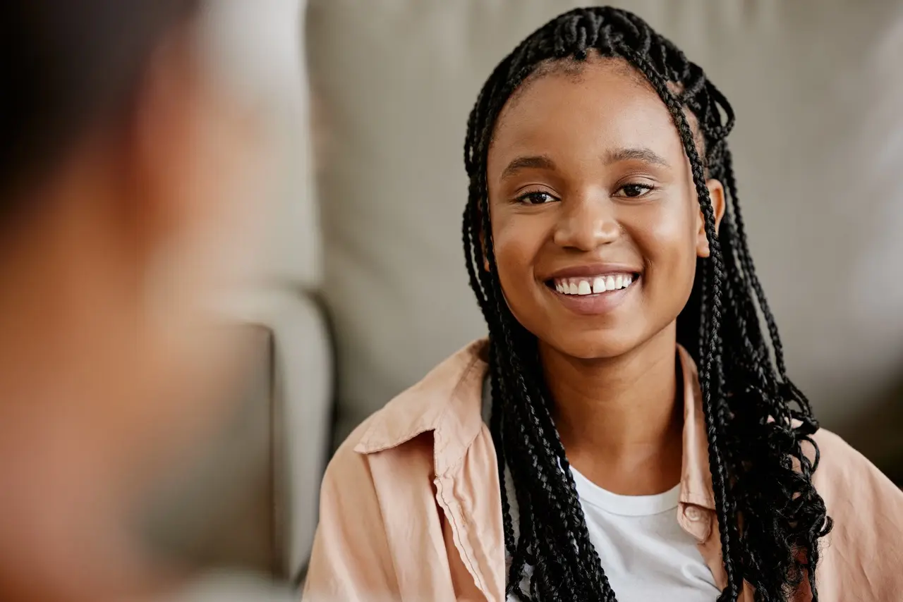 smiling woman with braids poses indoors 2026 01 09 09 59 18 utc Large - Mental Health Treatment at Sierra Meadows Behavioral Health